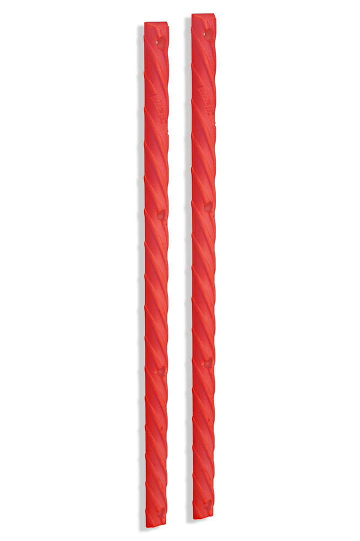 Pair of red Slappy Red Lines skateboard rails with a twisted licorice-inspired shape