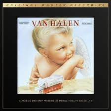 Van Halen '1984' original master recording album cover, featuring a young angel child holding a small book on a light background with a dark border.