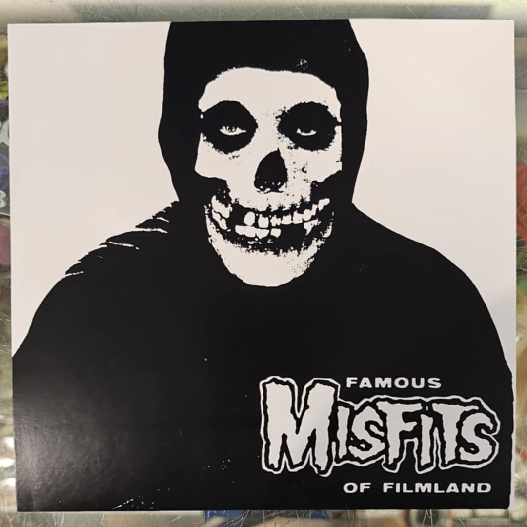7" Vinyl Record of a skeleton wearing a hoodie with 'Famous Misfits of Filmland' text on a reflective surface.