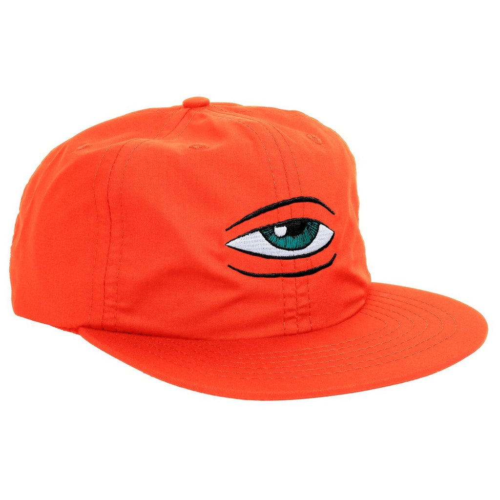 Orange cap with eye design on a white background