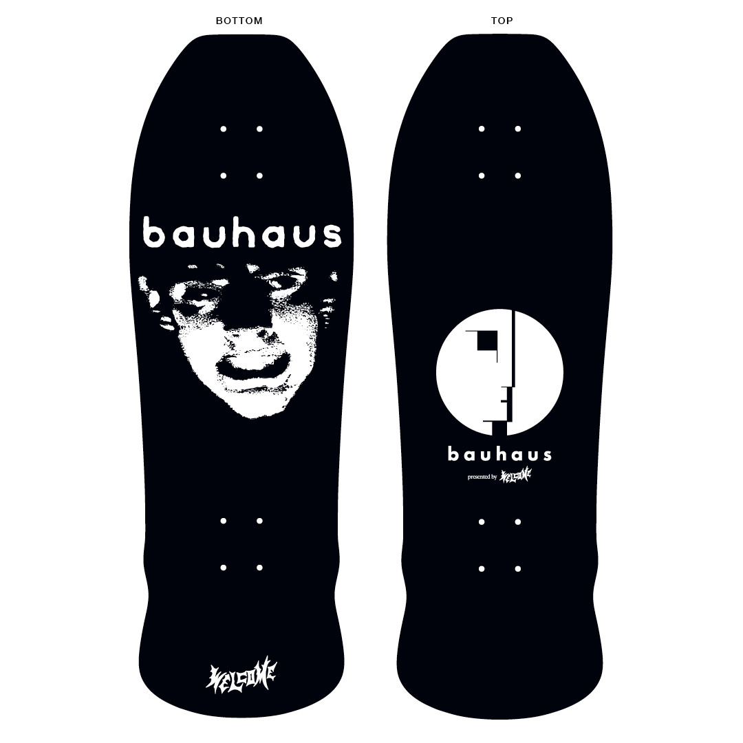 A 10-inch wide skateboard deck featuring a black background with white text and graphics, including the name 'bauhaus' and a stylized logo.