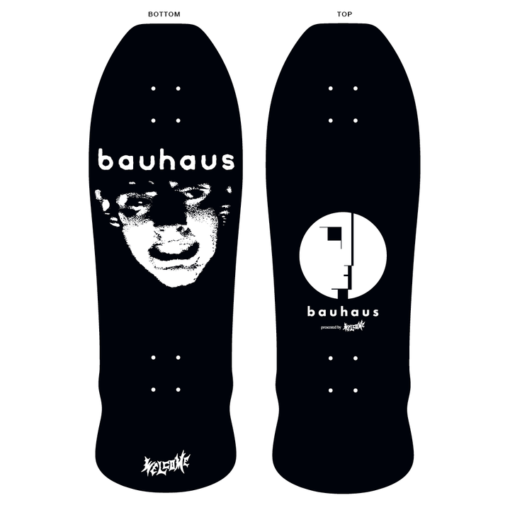 A 10-inch wide skateboard deck featuring a black background with white text and graphics, including the name 'bauhaus' and a stylized logo.