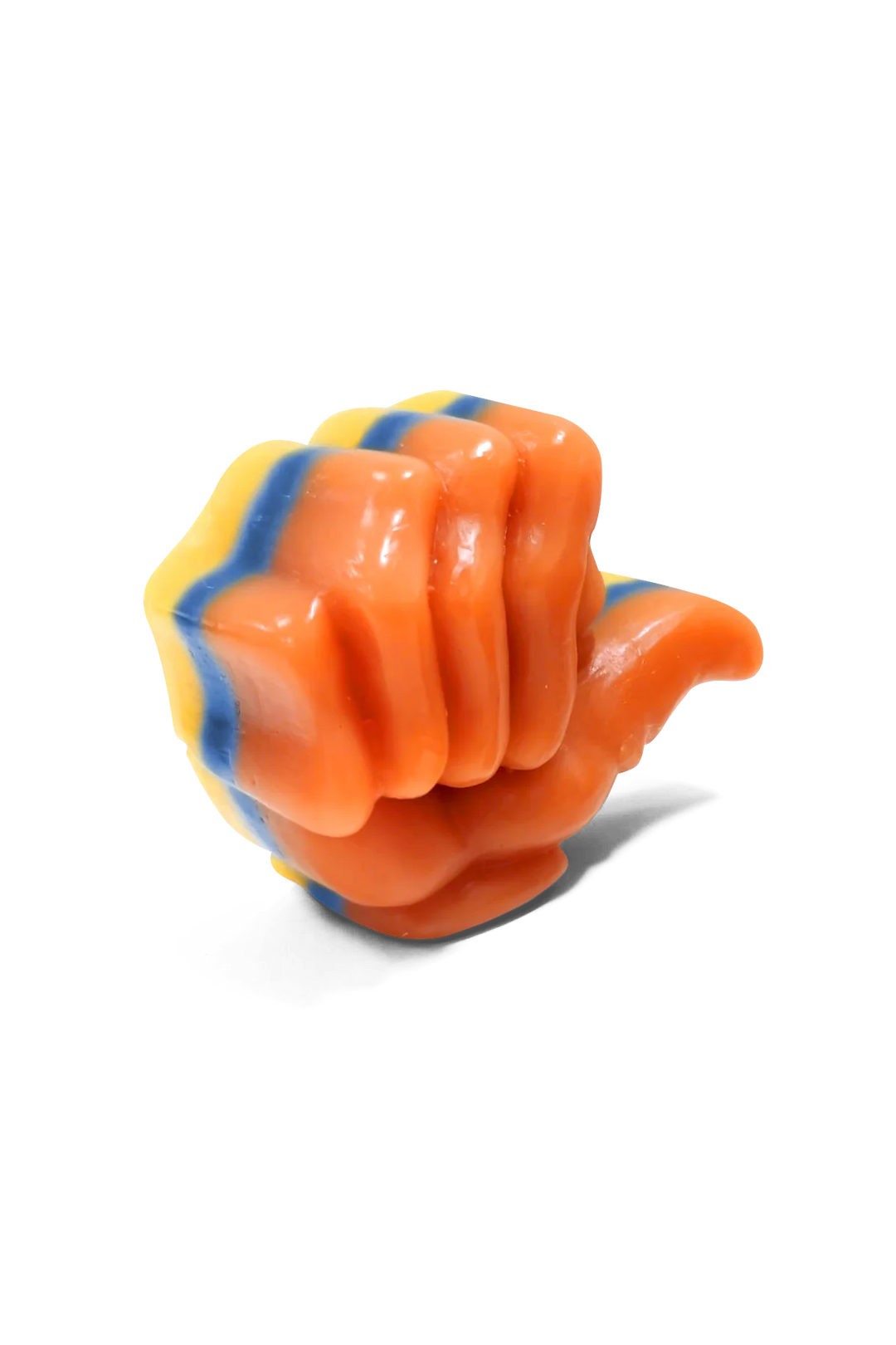 Orange and yellow wax with blue accents on a white background