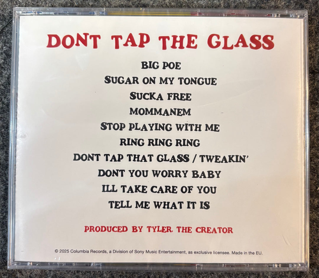 TYLER, THE CREATOR - DON'T TAP THE GLASS  case with tracklist and production credit on a textured surface