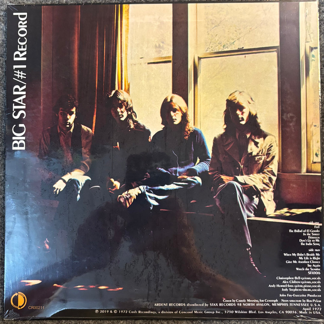 Album cover of Big Star's '#1 Record' with four band members sitting together.