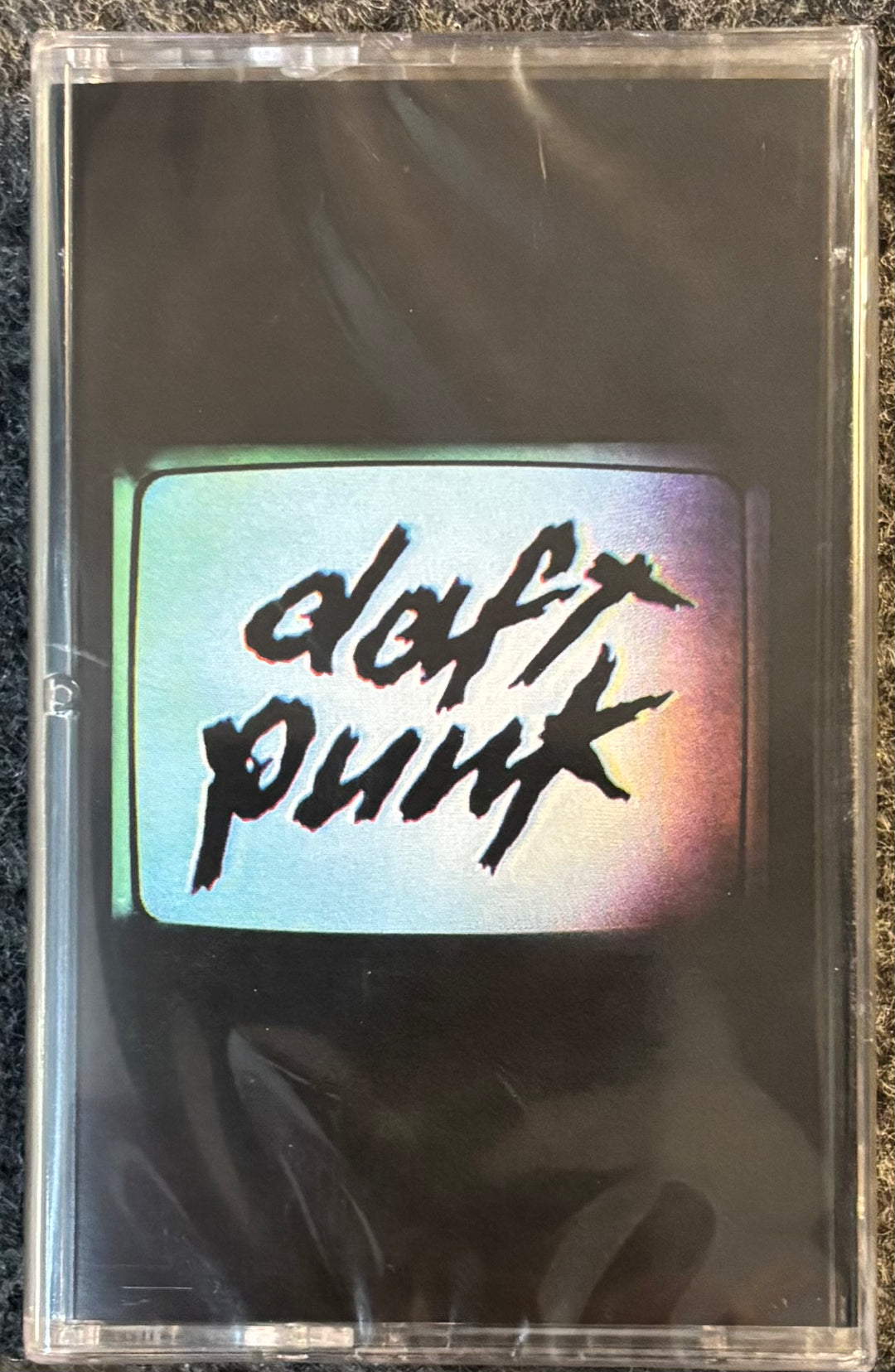 DAFT PUNK – HUMAN AFTER ALL tape with 'daft punk' text on a screen
