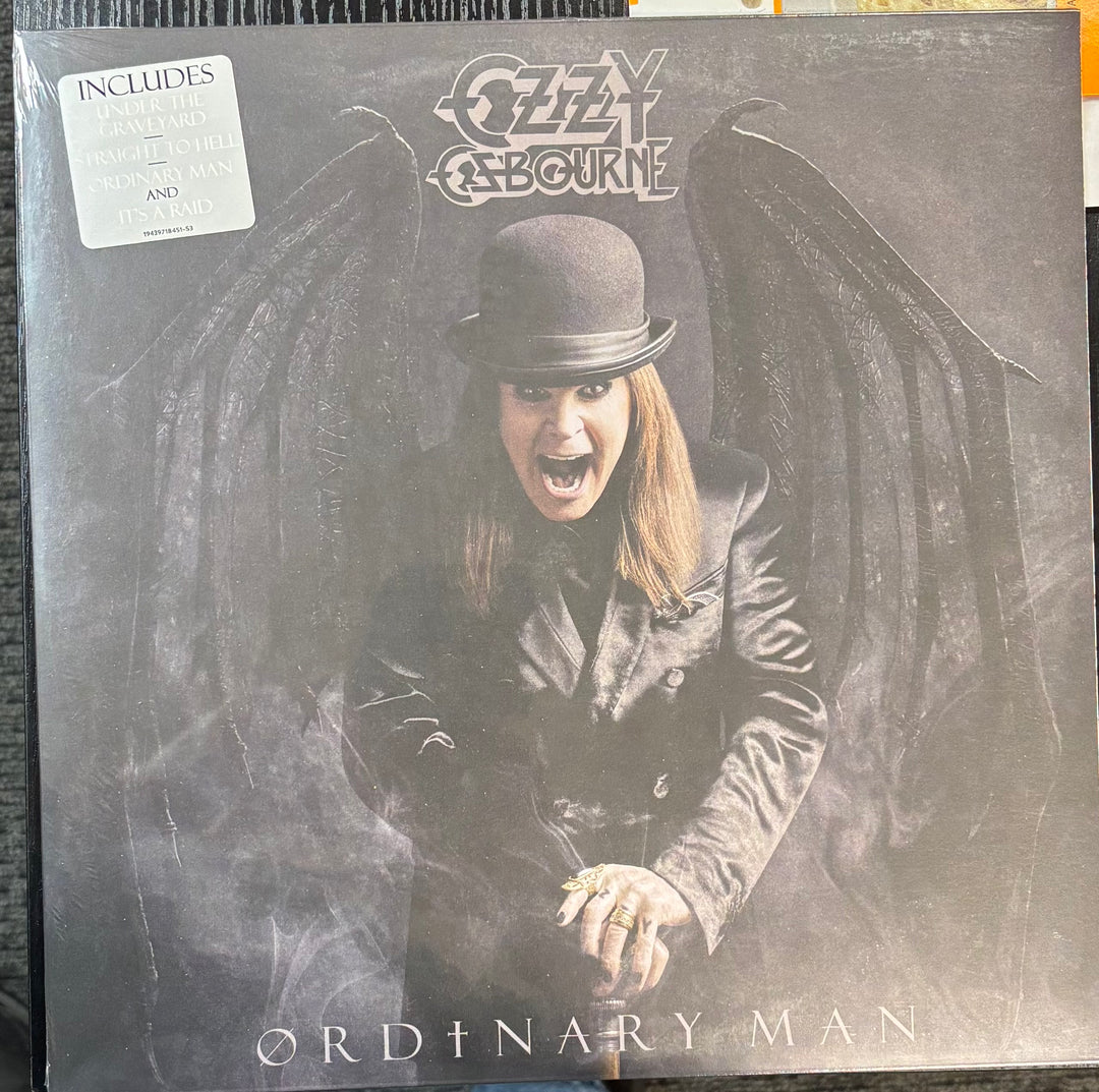 Ozzy Osbourne - Ordinary Man cover featuring a person with wings and the text 'Ozzy Osbourne Ordinary Man'.