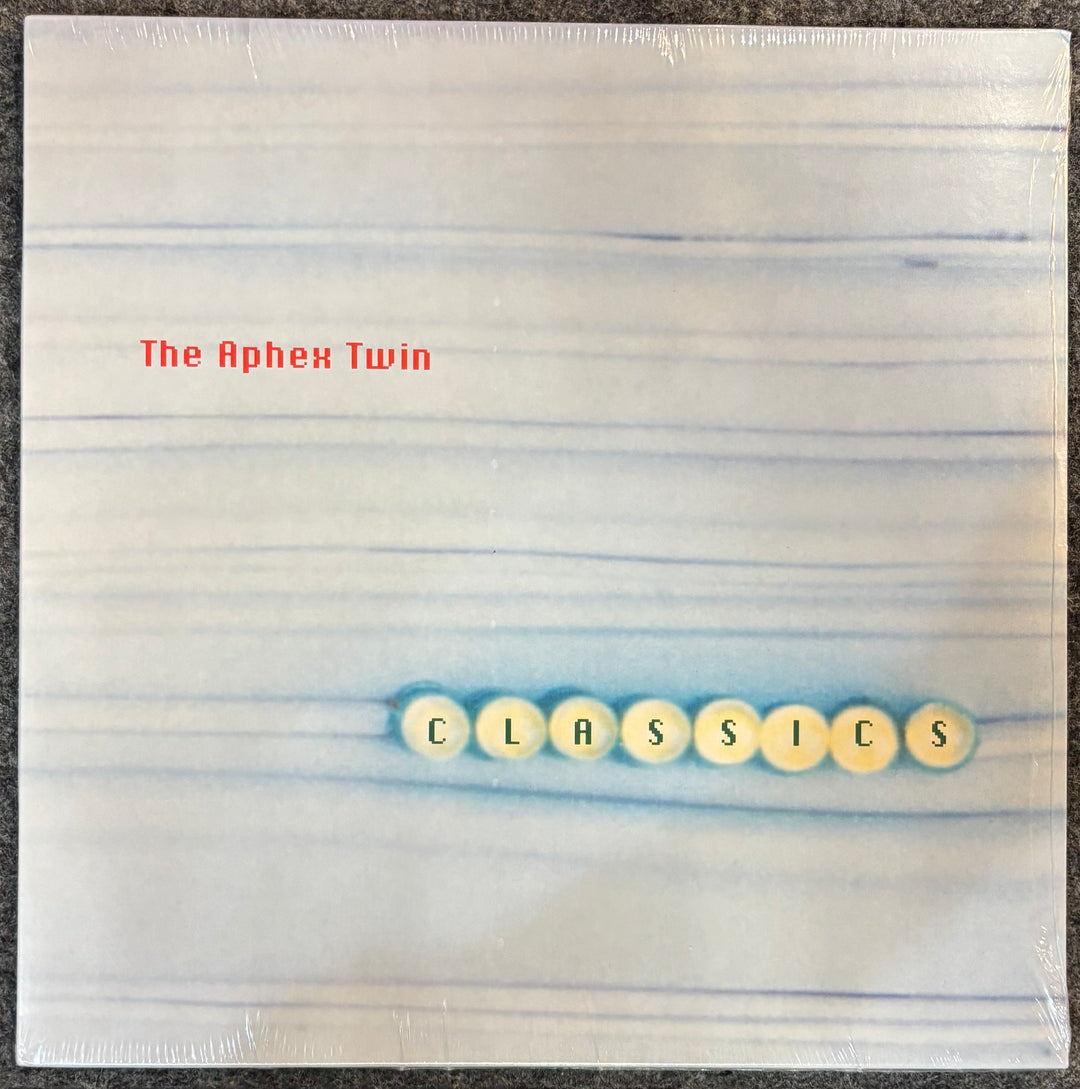 Album cover with 'The Aphex Twin Classics' text on a textured background
