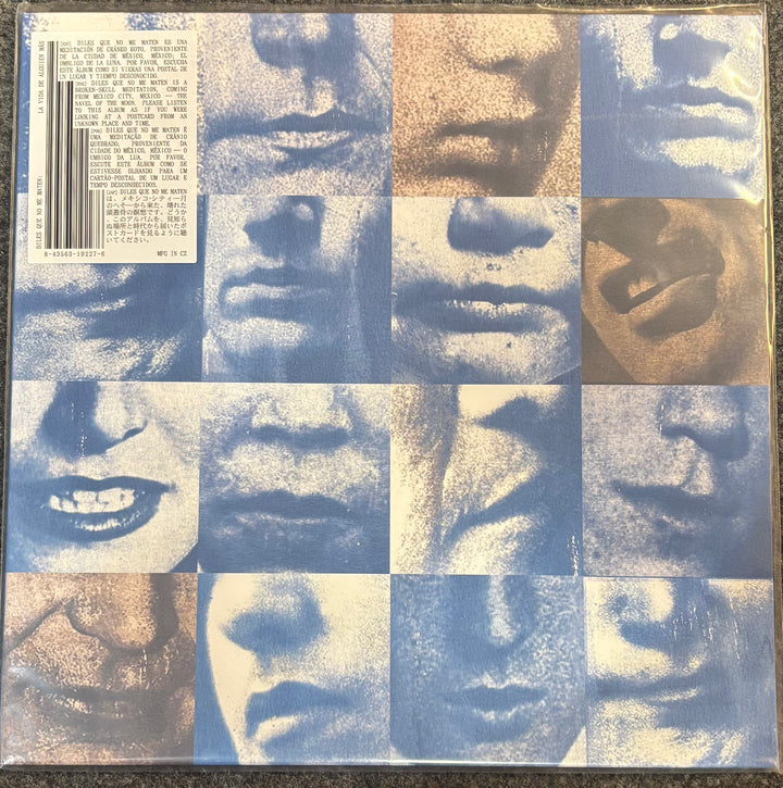 Diles Que No Me Maten - La Vida de Alguien Más, featuring a 3x5 grid of close-up portraits of a face in monochrome blue, gray, and beige tones. A barcode with Japanese text is visible in the top-left corner.