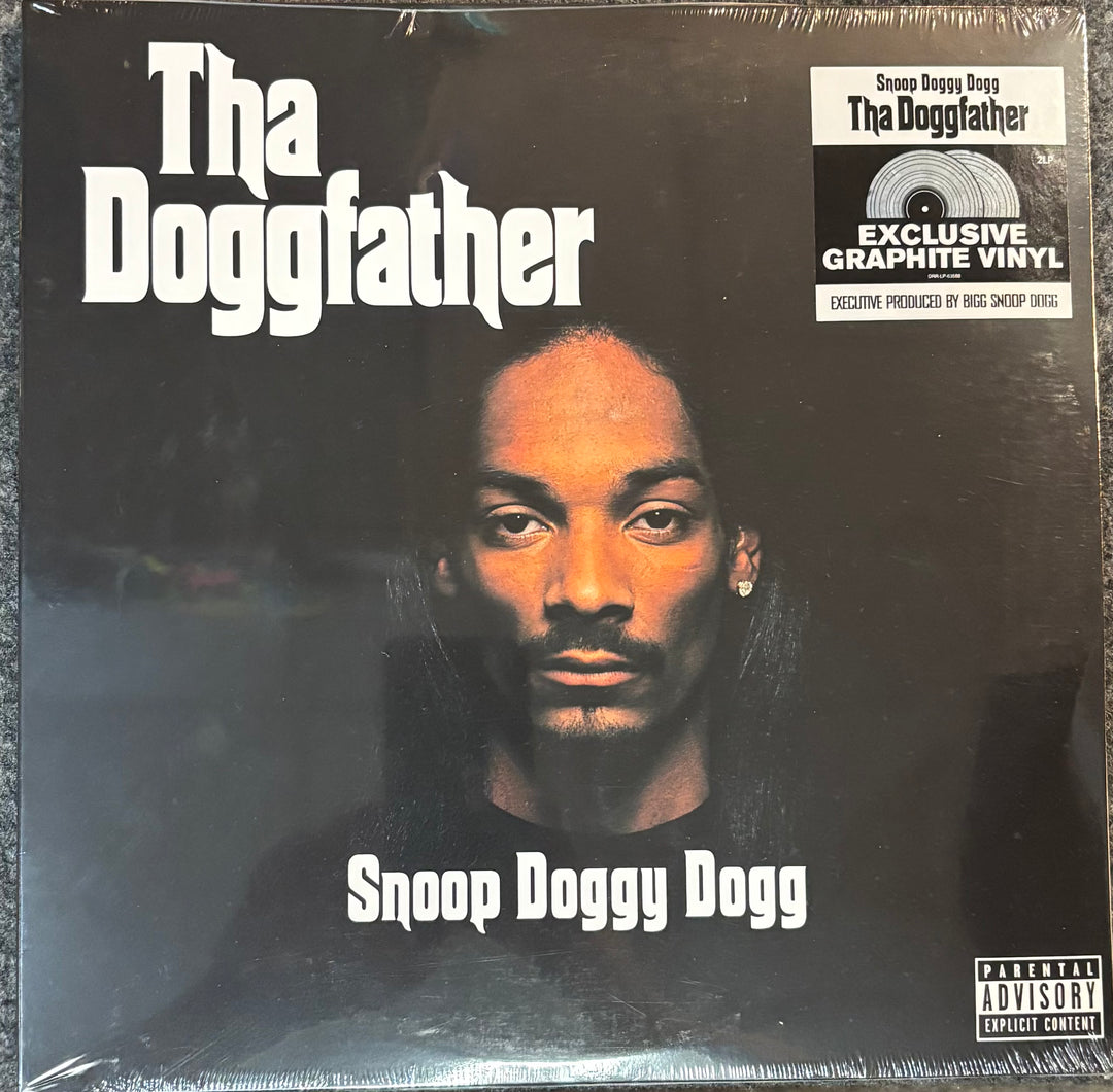 Vinyl album cover of 'Tha Doggfather' by Snoop Dogg with a dark background and text.