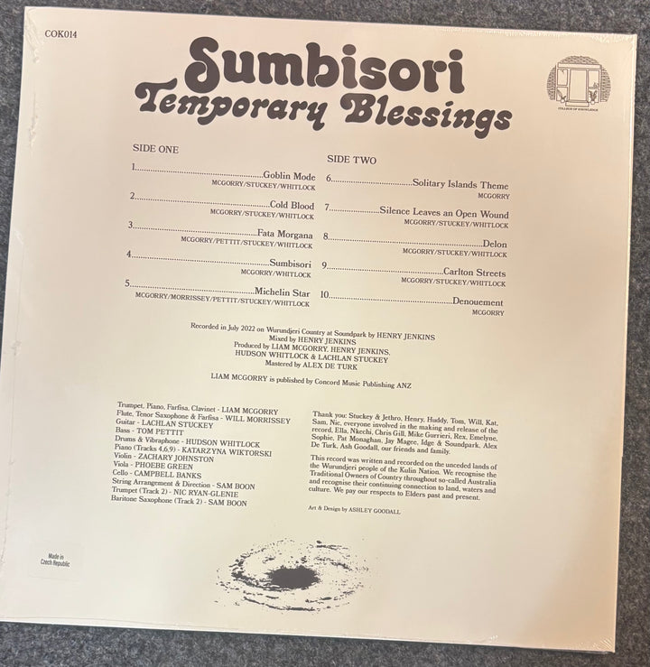 A vinyl record sleeve for Sumbisori - Temporary Blessings, photographed flat on a light beige background. The sleeve features black typography with track listings for Side One and Side Two, along with a small Mercury Will Rock logo in the top right corner.