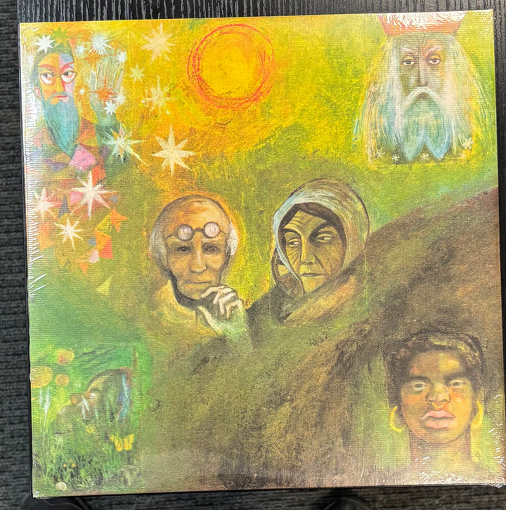 KING CRIMSON – In The Wake Of Poseidon artwork with faces and abstract elements on a textured surface