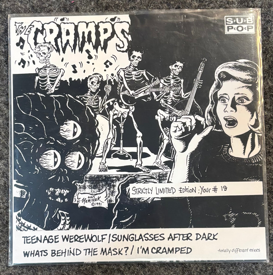 Album cover for The Cramps with black and white illustration of skeletons and a woman, featuring text and branding.