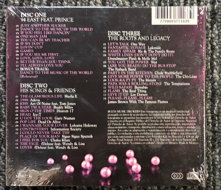 Back cover of the Many Faces of Prince album with track listings on a textured surface