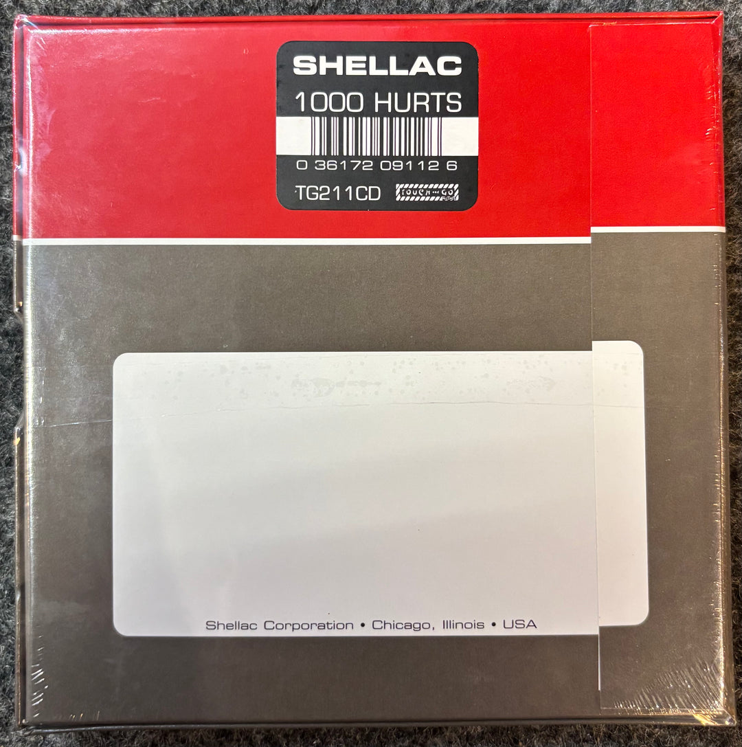 Packaged product with Shellac label on a red background