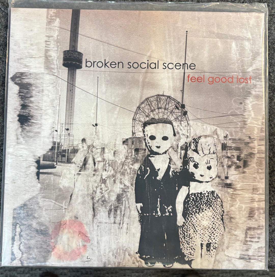 Album cover for 'Feel Good Lost' by Broken Social Scene with stylized illustration of two figures.