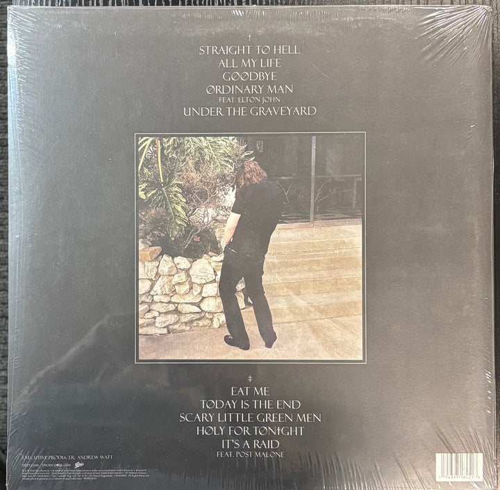 Ozzy Osbourne - Ordinary Man record cover with a person standing on steps and text
