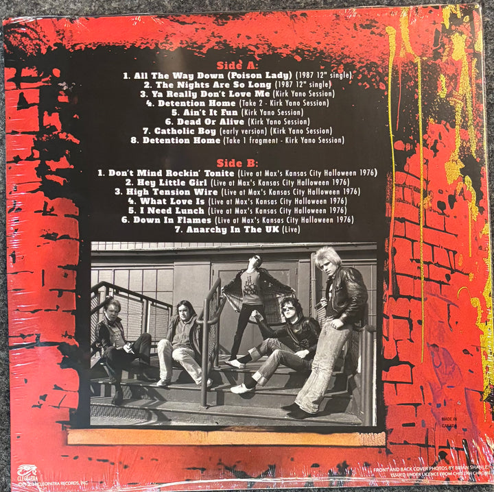 Dead Boys - Ignorance In Action record sleeve with tracklist and black and white photo of band members on a red background
