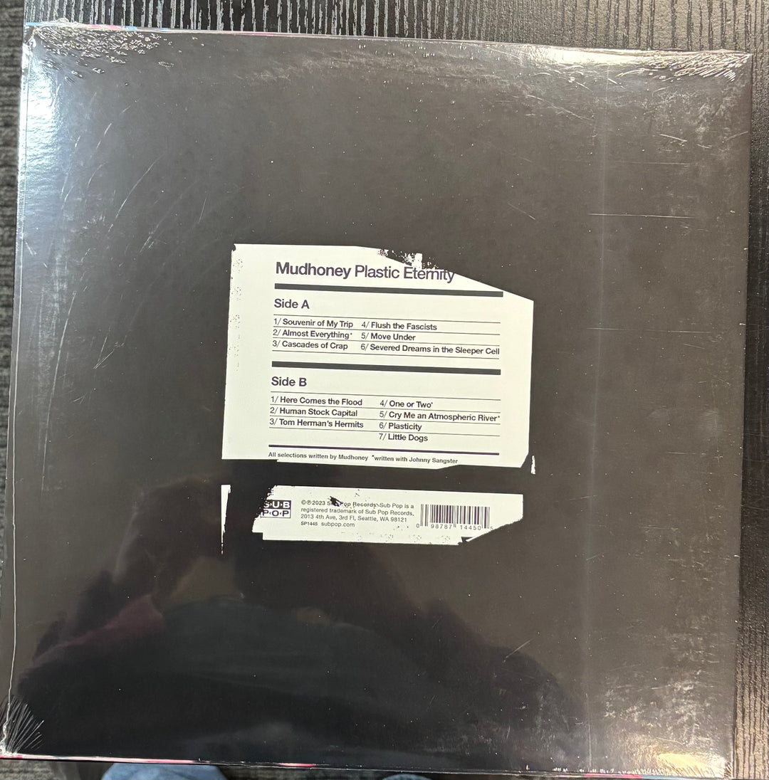Back cover of Mudhoney – Plastic Eternity with text and a label