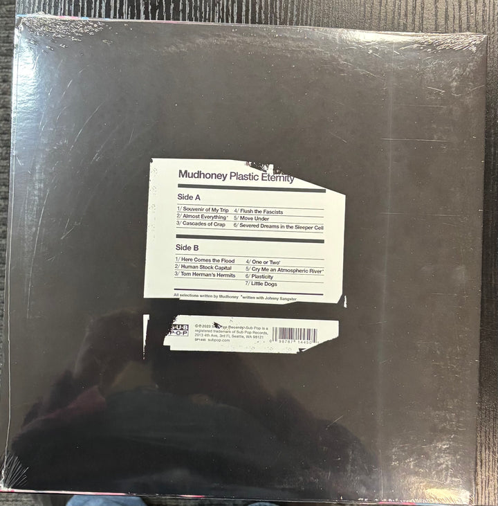Back cover of Mudhoney – Plastic Eternity with text and a label