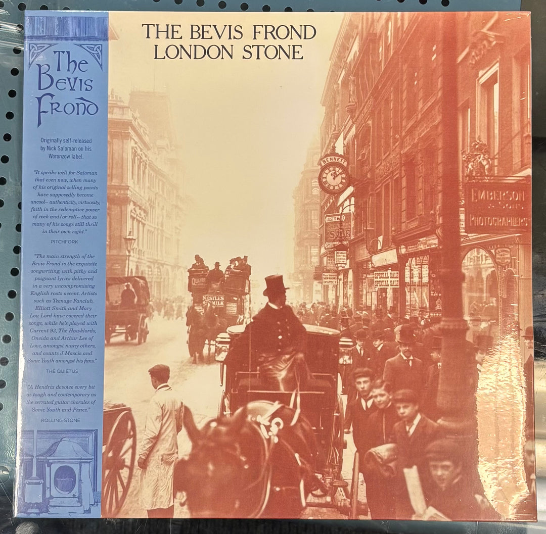 The Bevis Frond London Stone vinyl record album cover, featuring a sepia-toned vintage street scene with horse-drawn carriages and pedestrians, with a blue vertical band on the left containing tracklist text.