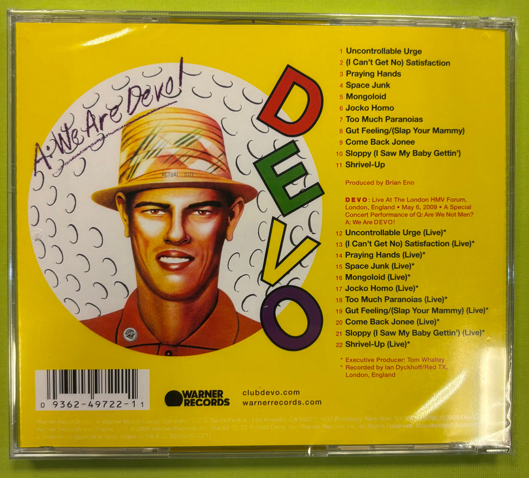 Back cover of a Devo album with a yellow background and album details.