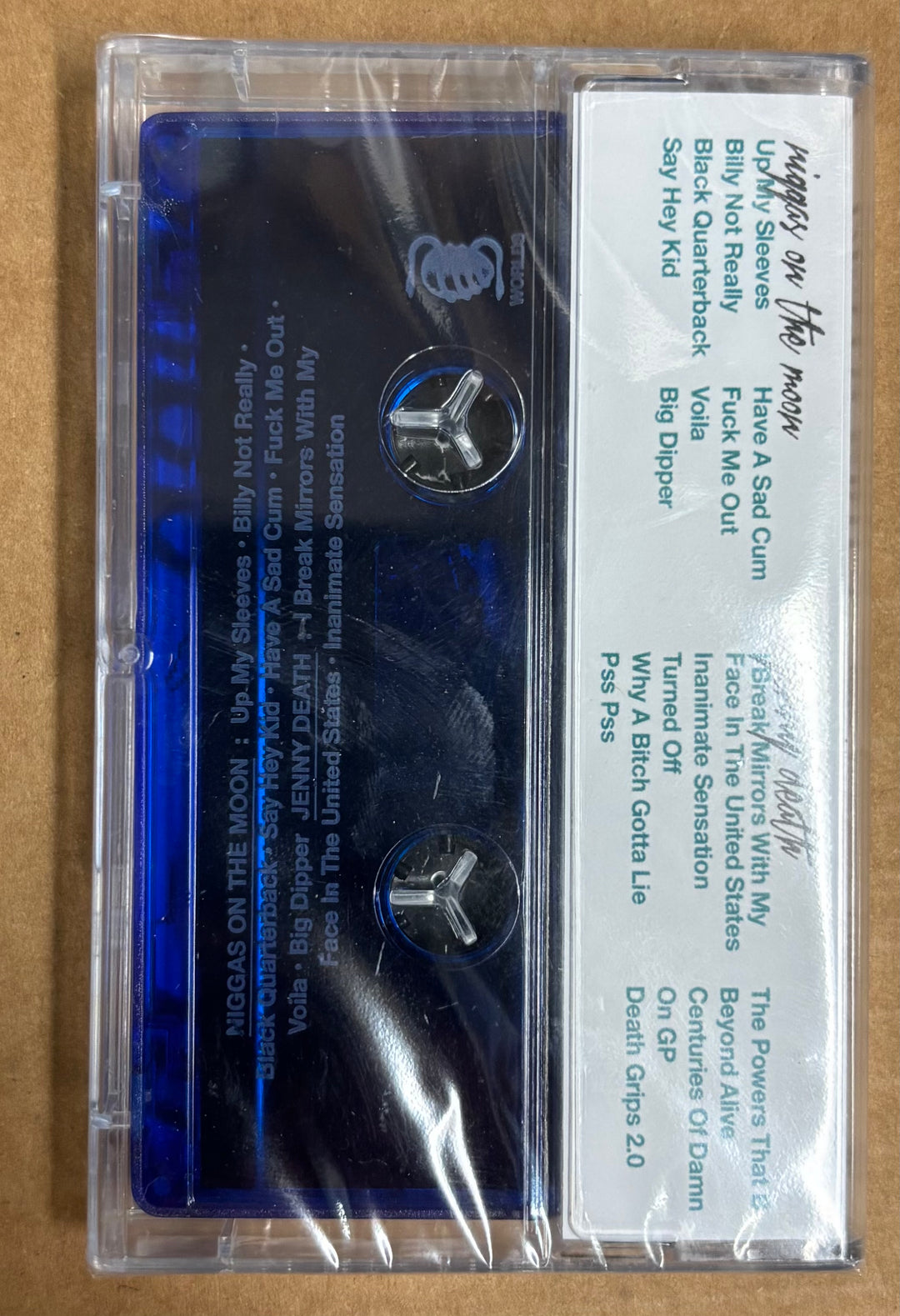 Cassette tape with label on a beige background