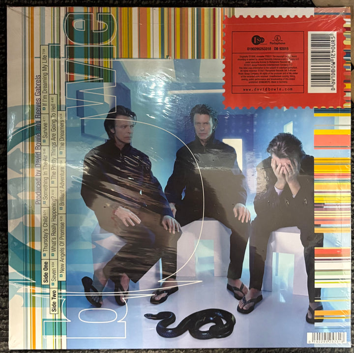 BOWIE, DAVID – Hours Album cover with three figures sitting and a snake, featuring a colorful border and text.