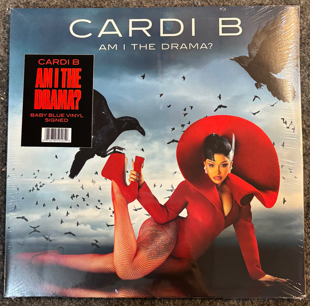 Vinyl album cover for 'Am I The Drama?' by Cardi B with a stylized image of a woman in a red outfit and birds.
