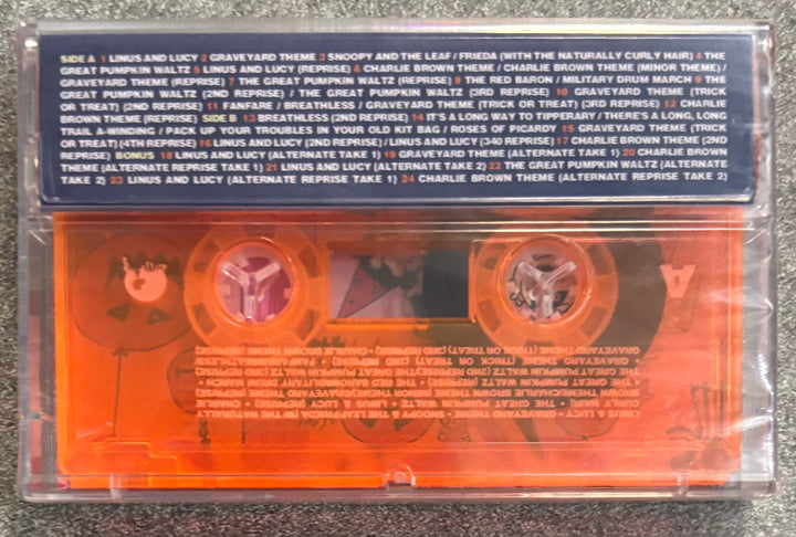 'It's the Great Pumpkin, Charlie Brown Orange cassette tape with text on a gray background