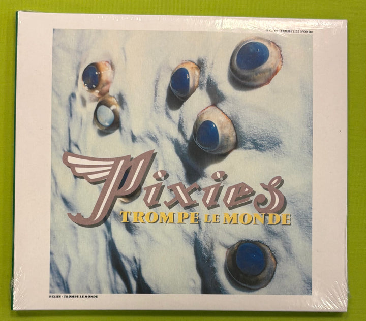 Album cover for Pixies' 'Trompe Le Monde' with a bear's face and the band name.