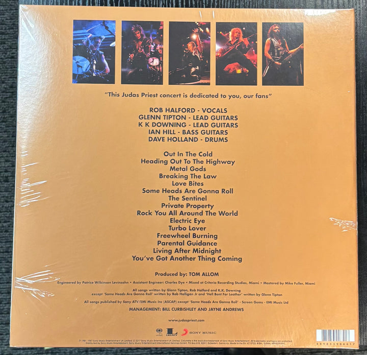 Back cover of Judas Priest ‎– Priest...Live with band members, tracklist, and promotional text.