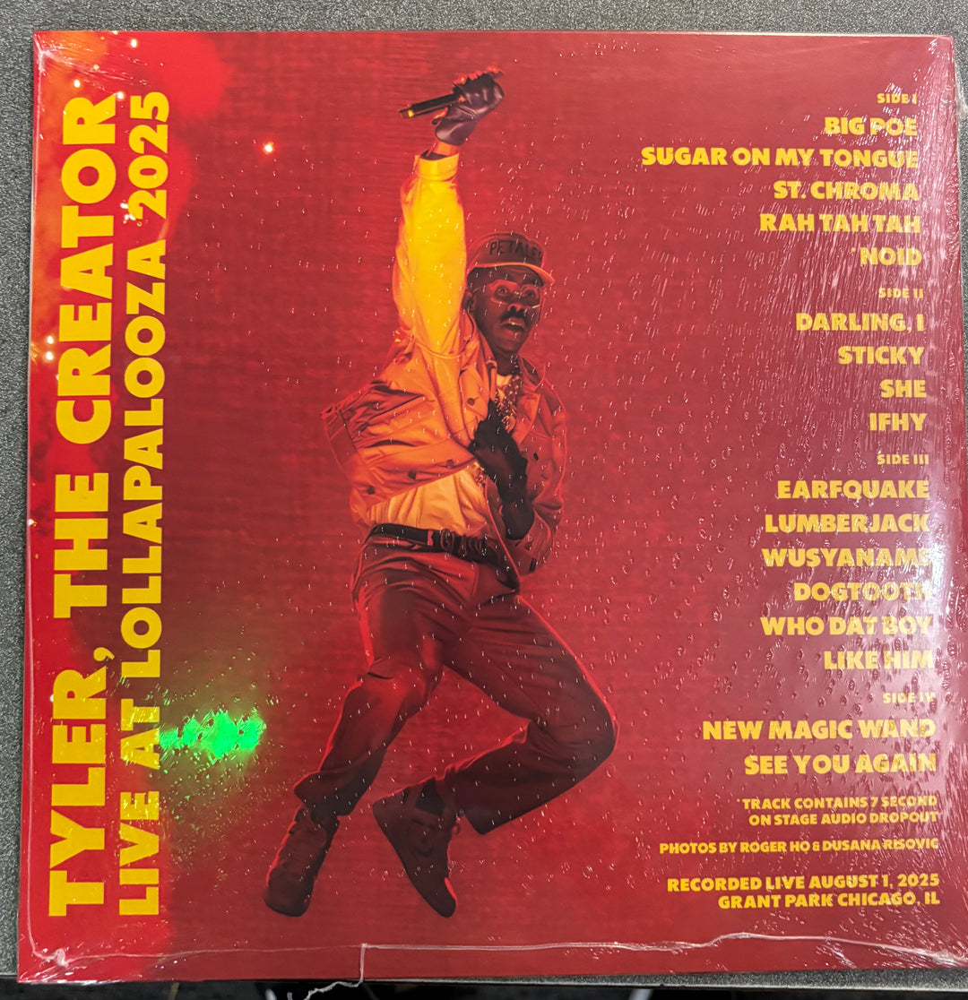 TYLER, THE CREATOR - LIVE AT LOLLAPALOOZA record cover with a person jumping, featuring text and a red background.