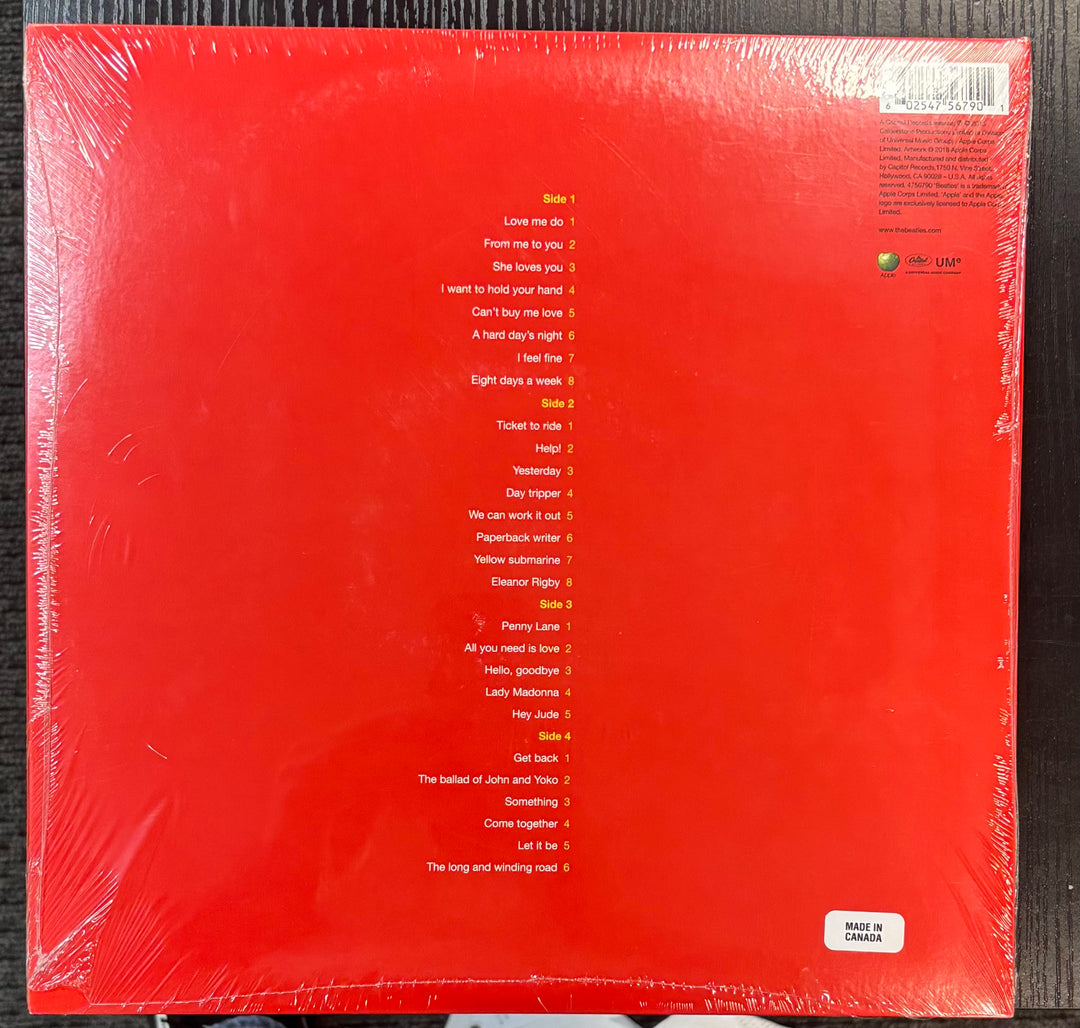 Back cover of Beatles, The - 1 with text on a red background