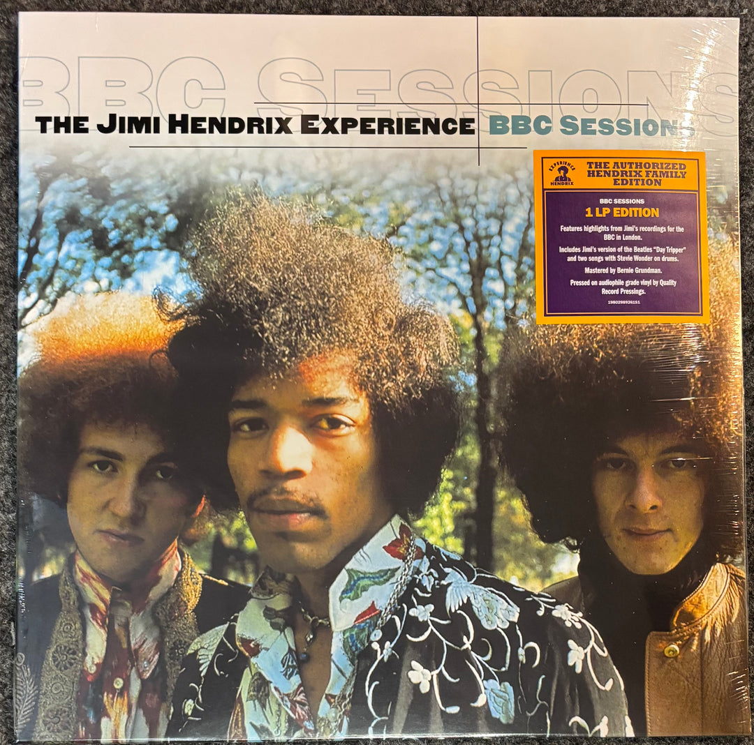Album cover of 'The Jimi Hendrix Experience BBC Sessions' with three band members and a tree in the background.