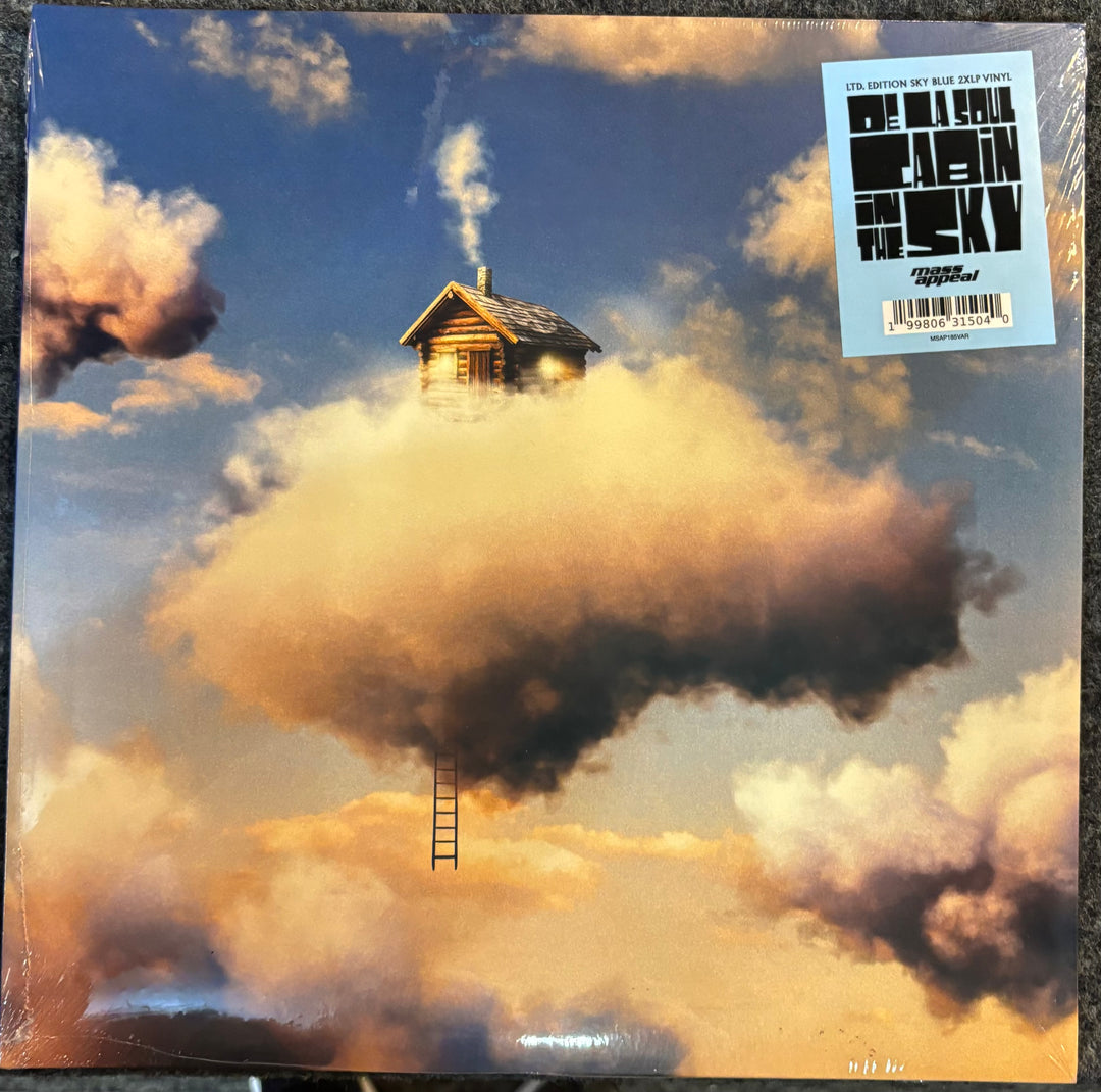 DE LA SOUL - CABIN IN THE SKY cover with a house in the clouds and a ladder, featuring a label on the top right corner.