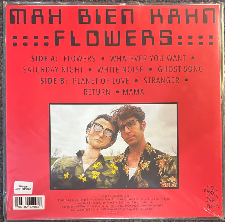 The back cover of a Max Bien Kahn / Flowers vinyl record, featuring a bright red background with black text listing track titles and a central square photo of the two musicians.