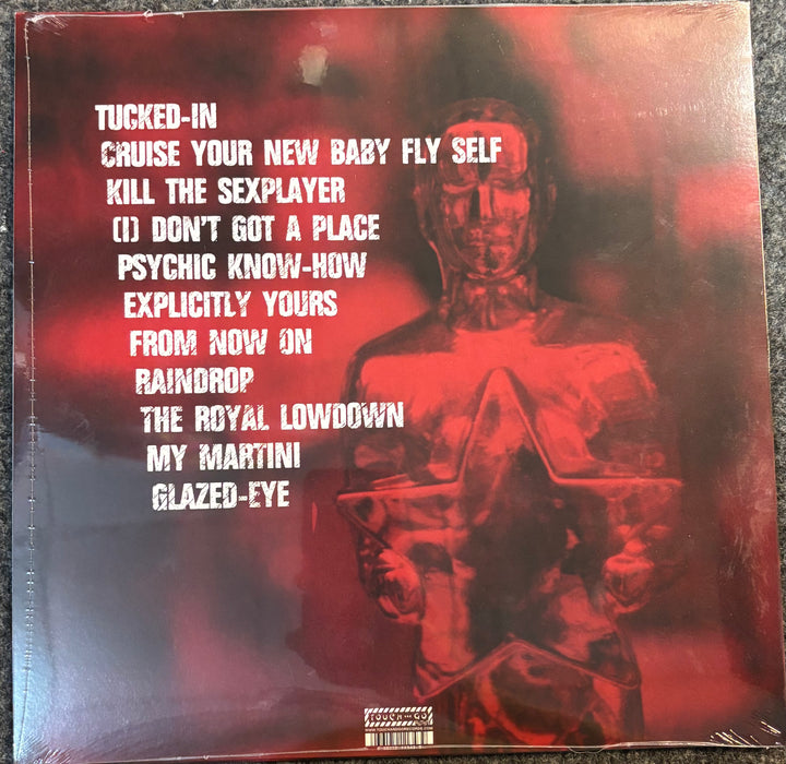 Vinyl record sleeve for Girls Against Boys - Cruise Yourself, featuring a red-toned statue holding a star and white tracklist text on the left side.