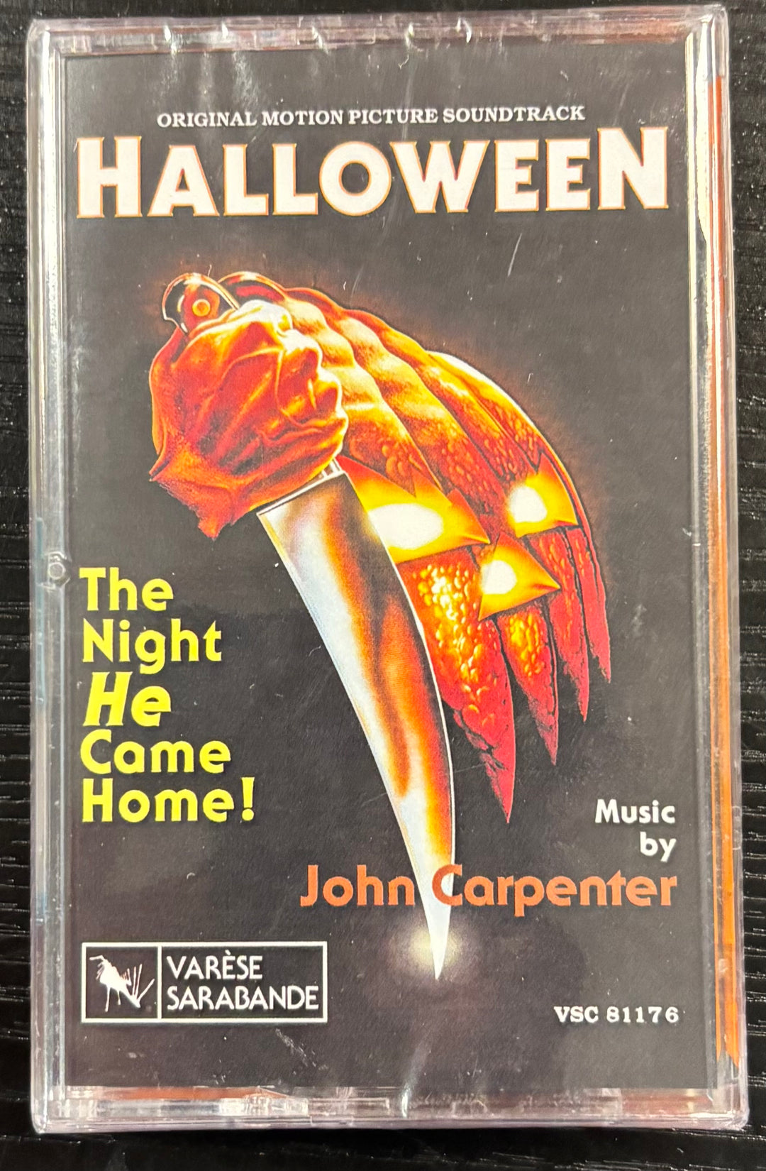 Cassette tape cover of 'Halloween' original motion picture soundtrack with a pumpkin face design.