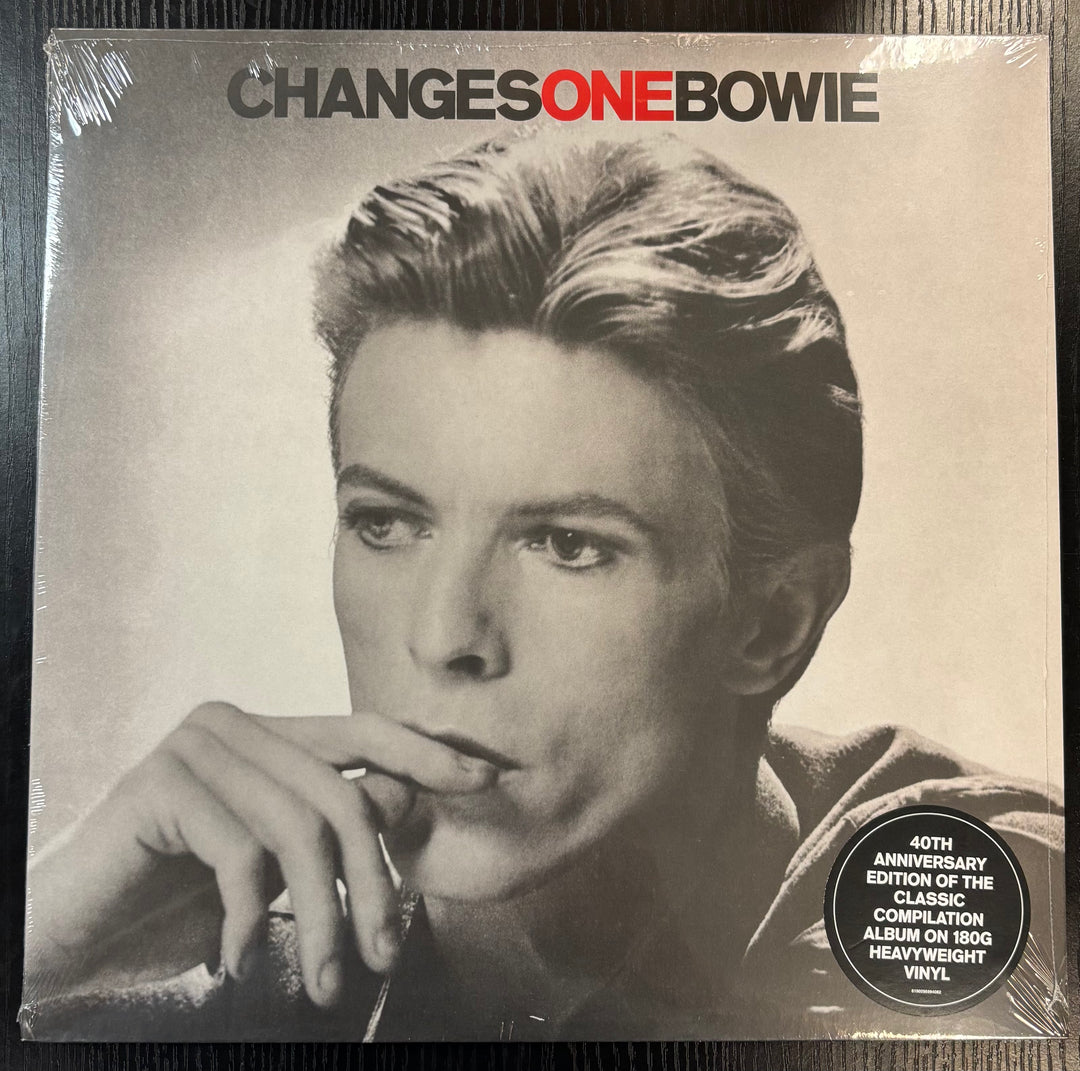 Album cover of 'ChangesOneBowie' with a black and white portrait of a person.