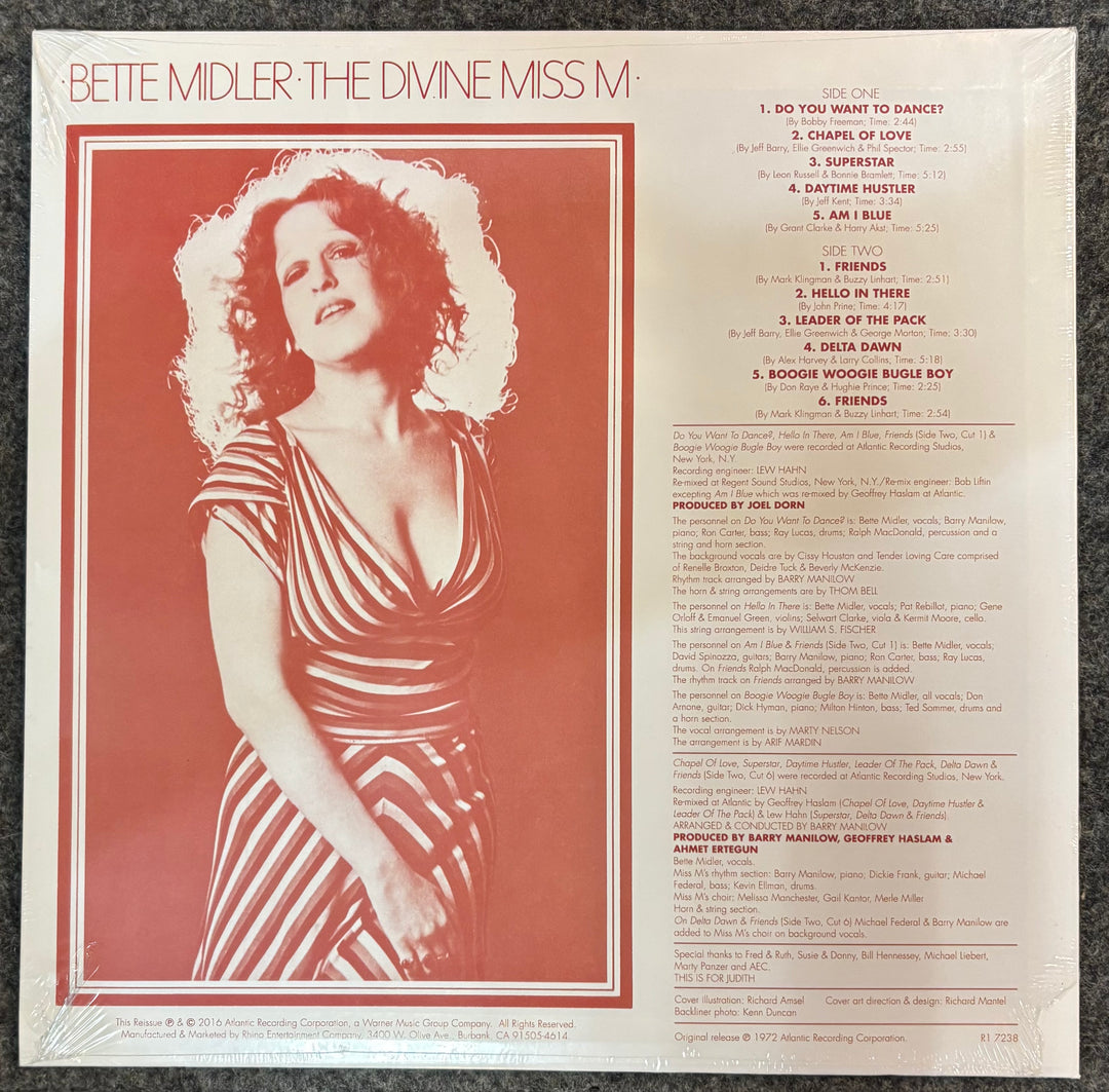 Album cover of 'The Divine Miss M' by Bette Midler with a portrait of the artist and tracklist.
