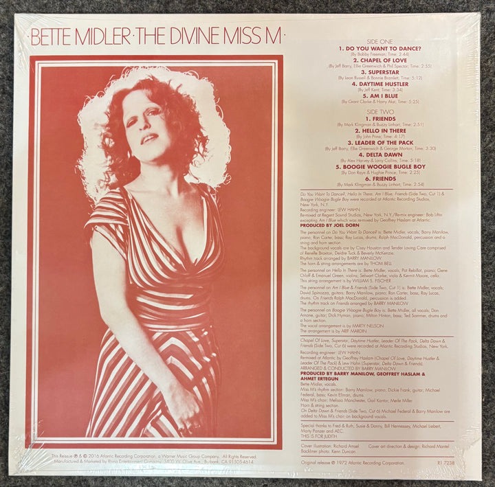 Album cover of 'The Divine Miss M' by Bette Midler with a portrait of the artist and tracklist.