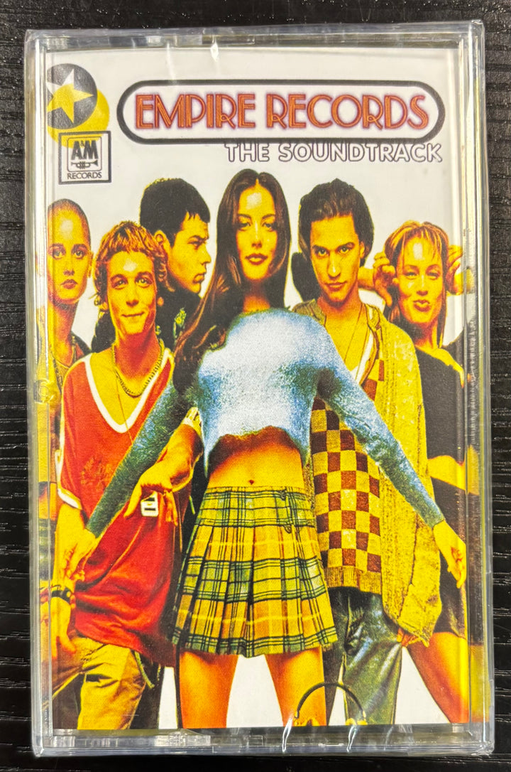 EMPIRE RECORDS Cassette tape cover featuring a group of people with a visible 'Empire Records' label.