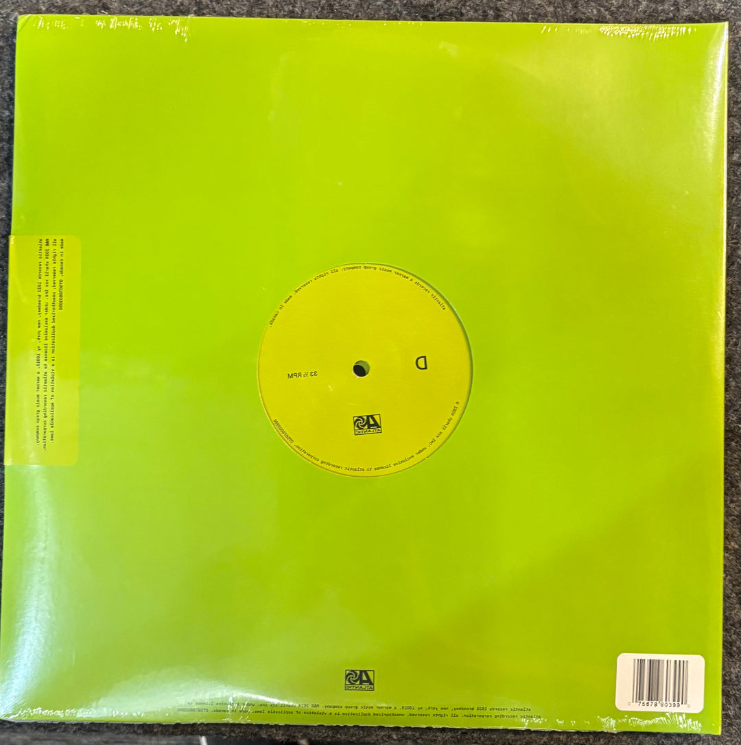 CHARLIE XCX - BRAT & IT'S COMPLETELY DIFFERENT... record with a yellow label on a green sleeve