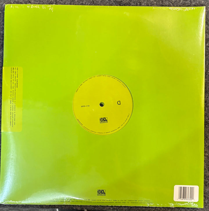 CHARLIE XCX - BRAT & IT'S COMPLETELY DIFFERENT... record with a yellow label on a green sleeve