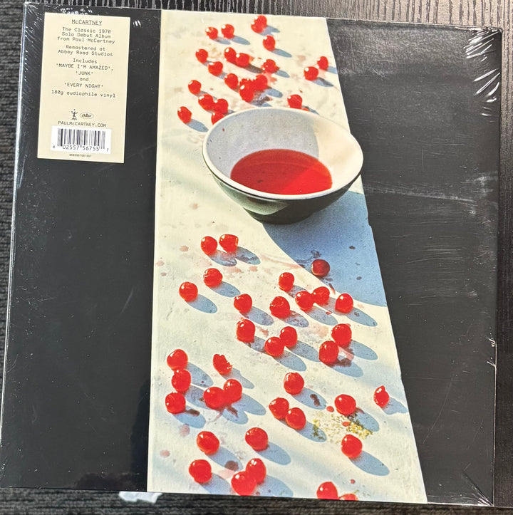MCCARTNEY, PAUL – McCartney record with a cover featuring red berries and a bowl on a black background
