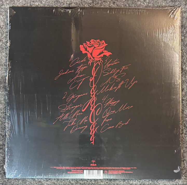 DOJA CAT - VIE Vinyl record with a red rose design and text on a black background