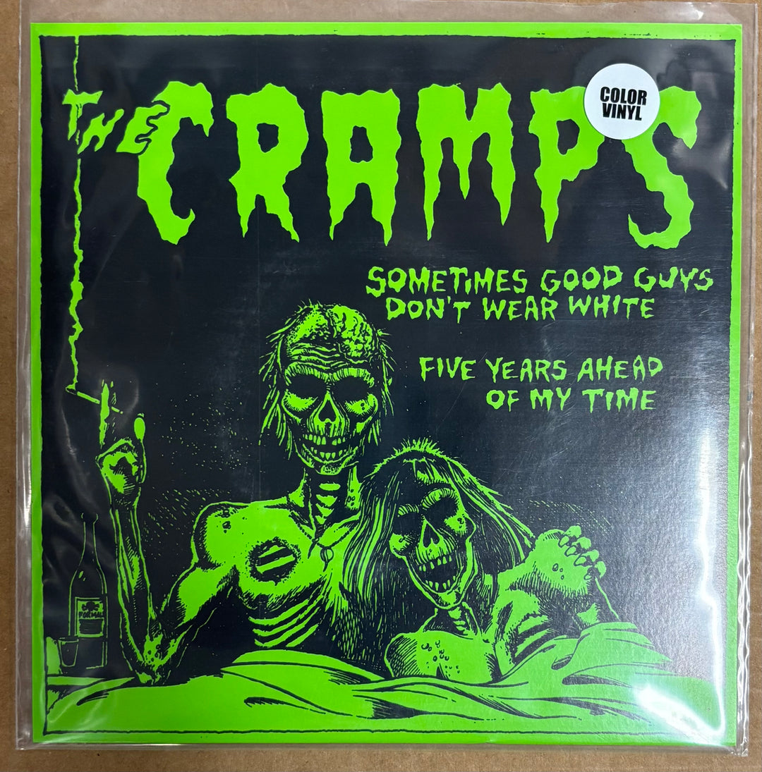Vinyl record cover for 'The Cramps' with green text and skeleton illustration.