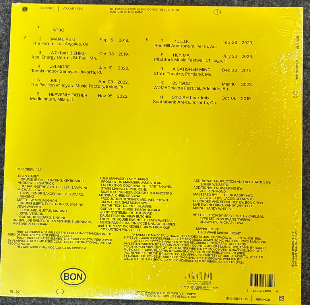 Back cover of Bon Iver - Volumes: One with tracklist and production credits on a yellow background