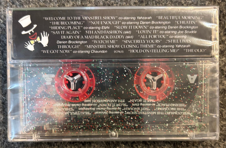 LITTLE BROTHER - THE MINSTREL SHOW Cassette tape with visible label and red labels on a dark surface